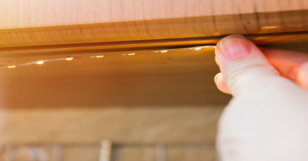 stock photo how to install led strip for lighting correctly on the surface of the cabinet on the kitchen set 1383681758 transformed 600x600