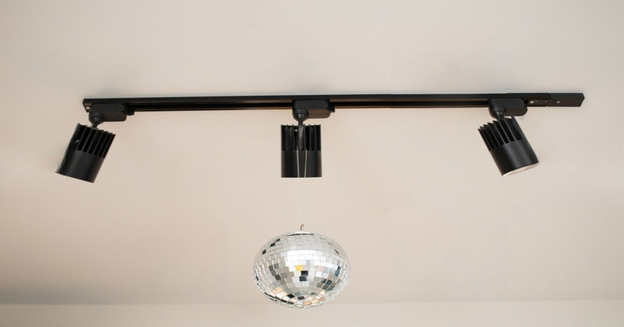 stock photo track light disco ball on the ceiling 2255313089 transformed
